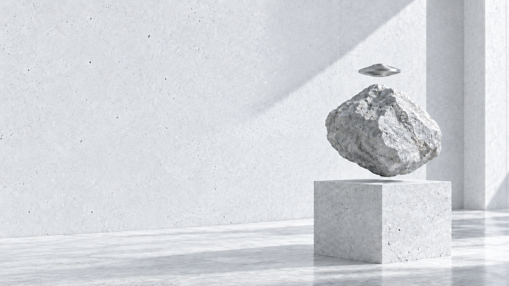 Small silver UFO hovering above a floating limestone boulder and pale stone pedestal in a sunlit gallery